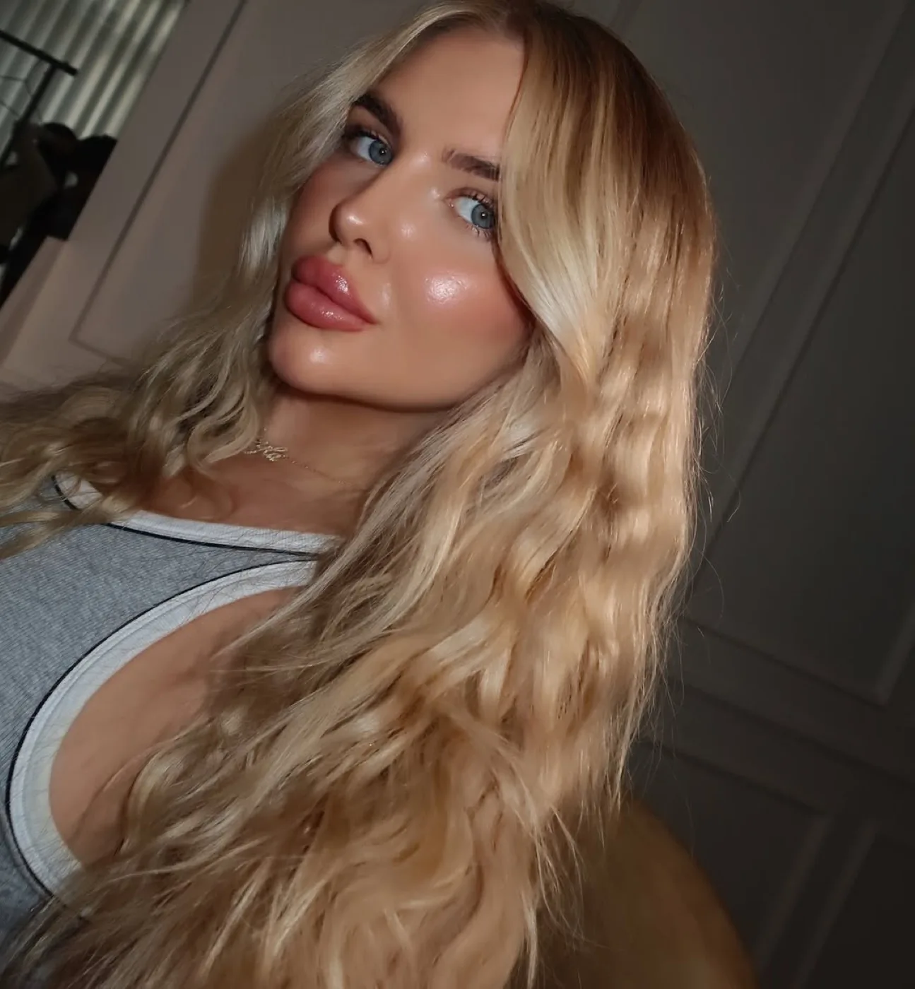 Soft glam makeup with glowing skin and nude glossy lips